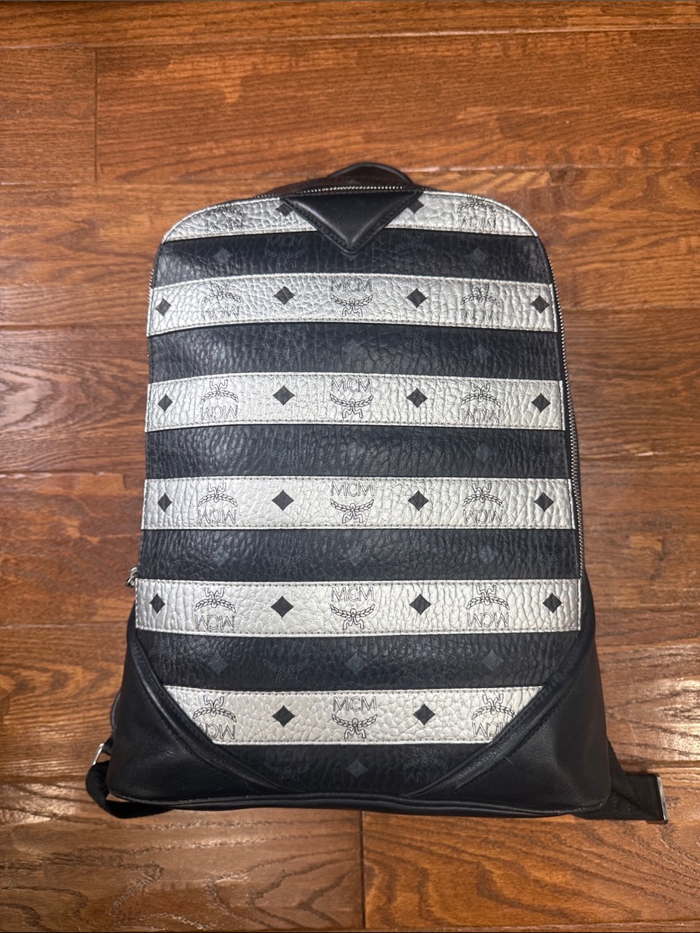 MCM Black and Silver Striped Logo Sling Backpack